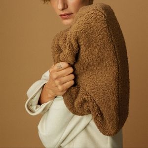 Textured faux-shearling clutch